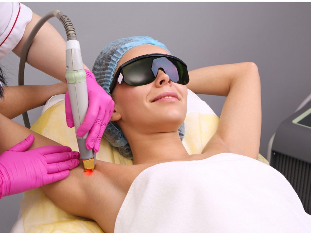 Woman in cosmetology studio on laser hair removal